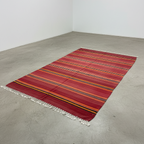 Vintage Moroccan Kilim Flatweave Rug – Handmade Wool Striped Carpet | 9.8 x 5.2 ft (3 x 1.6 m) | Red, Black, Orange & Yellow Rustic Boho